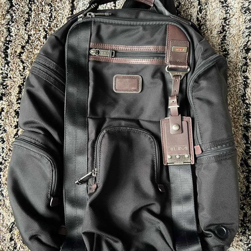 Tumi Black Backpack with Durable Design and Professional Style